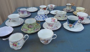 lot 210 image: Assorted china tea cups, saucers, tea plates. Some of the designers are Royal Kent bone china, Royal Crown derby, Lefton china, Colorel china by Copland and Paragon china and many more