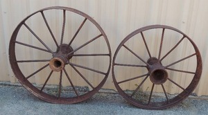 lot 152 image: 2 cast iron wagon wheels 32 and 27 (very Heavy)