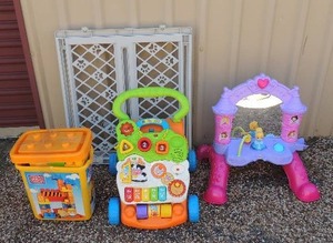 lot 268 image: Mega blocks play blocks, 123 baby walker, Cinderella play castle, gray baby gate