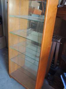 lot 307 image: Wood frame glass shelving unit 4 shelves glass slide in front 45x 20x 7