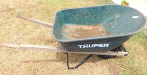 lot 242 image: Truper blue wheel barrow with a flat