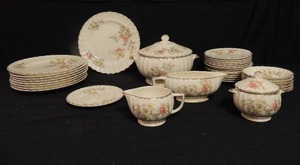 lot 297 image: Limoges 22K gold china floral design- Sugar & creamer, gravy boat, 6 small soup bowls, 1 covered soup tureen, 9 dinner plates 14 bread plates