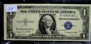 lot 219 image: 1935 G $1 One Dollar Silver Certificate Crisp Uncirculated Blue Seal