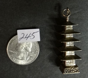 lot 245 image: LARGE SILVER JAPAN STERLING CHARM - STAMPED