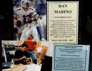 lot 246 image: WOODEN PLAQUE FEATURING AN AUTOGRAPHED PHOTO OF DAN MARINO - MIAMI DOLPHINS HOF LEGEND - WCOA