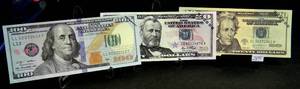 lot 289 image: UNIQUE - U.S. Bills Practice Dollars, $20, $50, $100 Bills, China Stamped