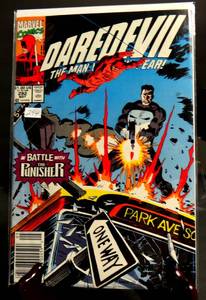 lot 294 image: MARVEL - MAY 1991 #292 - DAREDEVIL IN BATTLE WITH PUNISHER - SLEEVED WBOARD