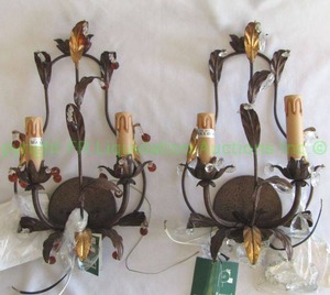 lot 9 image: Passeri International artistic wall sconce chandeliers wrought iron articles set of two, 16 tall x 9 wide. bid is times the quantity