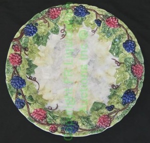 lot 13 image: Hand painted in Italy ceramic Uva decor plate, 15.5 wide