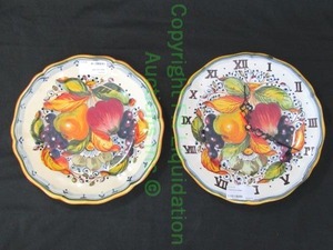 lot 16 image: Fiore decor plate and wall clock plate, Italian ceramic, both 11 wide. bid is times the quantity