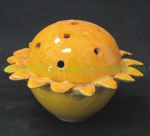 lot 35 image: Italian terra cotta ceramic sunflower floral frog, 6 tall x 7.5 wide
