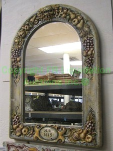 lot 160 image: Tuscan arch top frutta framed mirror, approx 32 tall