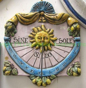 lot 187 image: Italian ceramic Tuscan Sun dial wall decor, 13 tall x 12 wide