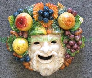 lot 184 image: Italian ceramic frutta Bacchus masks