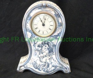 lot 100 image: Italian ceramic Cherubino mantle clock, 10 tall