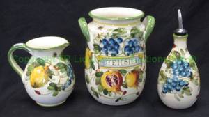 lot 109 image: Italian ceramic frutta Utensil jar, creamer pitcher & oil cruet