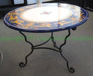 lot 3 image: Italian volcanic table wrought iron base, 40 wide x 29 tall