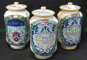 lot 116 image: Artist signed Sberna Deruta Diambra, Caffe, Camphora canisters, 6 tall each. Bid is times the quantity