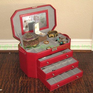 lot 37 image: Desk top jewelry box with assorted fashion jewelry