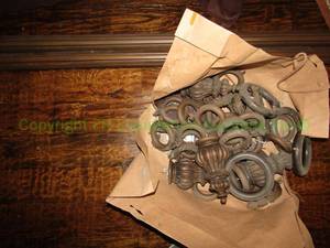 lot 18 image: Ornate Curtain rod and rings