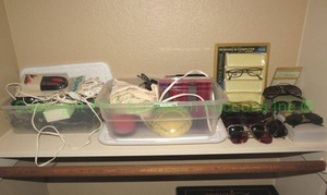 lot 78 image: Assorted sun glasses, curling set and more as shown