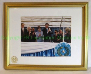 lot 153 image: Signed George W. Bush and Laura Bush framed photo. Ink has faded but still visible, 13 x 16