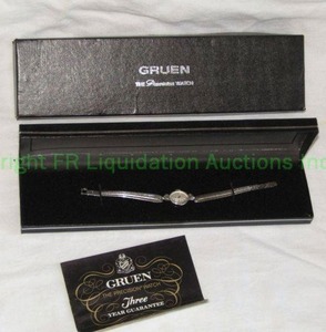 lot 51 image: Gruen Switzerland ladys watch stamped Gruen 14K on back