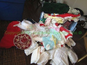 lot 66 image: Assorted doll clothes and more as shown