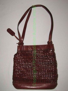 lot 104 image: Etienne Aigner leather weave purse