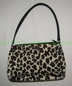 lot 105 image: Kate Spade leopard pattern purse