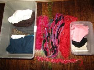 lot 112 image: Assorted scarves and clothing as shown