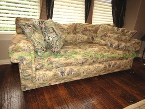 lot 162 image: African wild theme sofa