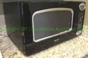 lot 135 image: Sharo Carousel microwave oven model R-428JK