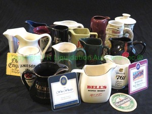 lot 150 image: Whiskey logo branded carafes plus