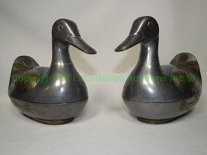 lot 381 image: Pewter duck storage containers, approx. 8 long