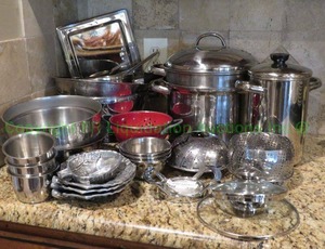 lot 336 image: Stainless steel pots and pans as shown