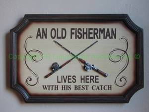 lot 212 image: An Old fisherman lives here wall placard