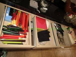 lot 331 image: Contents of 4 drawers including utensils, candles and more