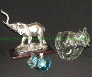 lot 320 image: Block crystal figural elephant oil candles plus