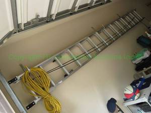 lot 449 image: Werner 28ft extension ladder plus electric extension cord