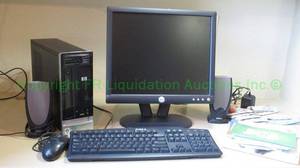 lot 277 image: HP desktop PC system with Dell monitor