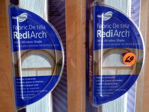 lot 69 image: PAIR OF REDI-ARCH WINDO SHADES - FITS HALF ROUND ARCH WINDOWS - NIP