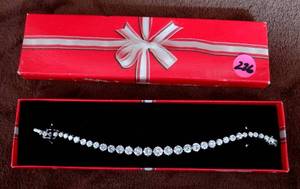 lot 226 image: VINTAGE DIAMOND LOOK TENNIS BRACELET