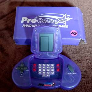 lot 228 image: Vintage ProColor 200 Games Purple Handheld Electronic Game