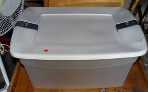 lot 262 image: PLASTIC TOTE WITH LOCKING LID