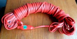 lot 297 image: EXTRA LONG EXTENSION CORD (I BELIEVE 75 FEET)