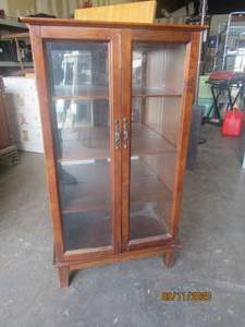 lot 217 image: FOUR SHELF GLASS DOOR&nbsp WOOD CURIO CABINET&nbsp&nbsp 24 L X12 X 43 H&nbsp