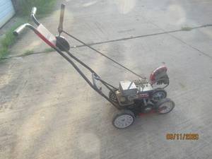 lot 293 image: BRIGGS &amp STRATTON 3.5 HORSEPOWER&nbsp 9 X&nbsp 2 12&nbsp EDGER BLADE YARD MACHINE&nbsp
