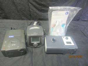 lot 406 image: SENSAWAKE CPAP - PHILLIPS RESPIRONICS&nbsp - C FLEX REMSTAR PRO - UNTESTED PARTS ONLY AND A NEW PHILLIP FULL MASK IN PACKAGE