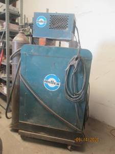 lot 35 image: MILLER WELDER WITH MILLER WELDING RADIATOR ON CASTERS ( TANK NOT INCLUDED)